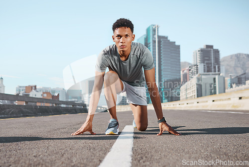 Image of City street, runner start and athlete training for marathon race, exercise or fitness challenge on Los Angeles California road. Running motivation, body wellness and black man focus on health goals