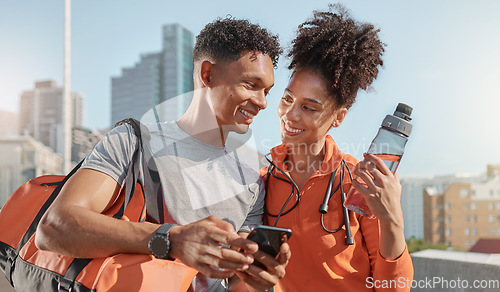 Image of Couple, fitness team or phone in city for fitness management app, health data analysis or workout progress report. Smile, happy man and woman or sports friends bonding with mobile training technology