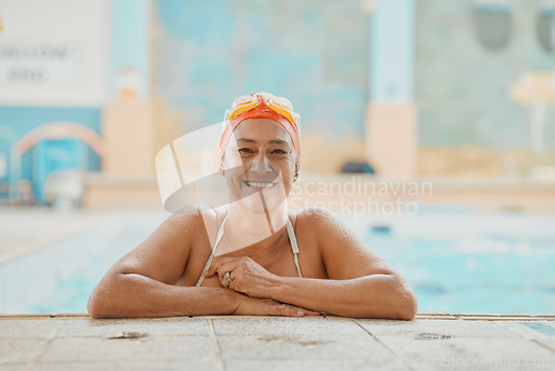 Image of Swimming, physiotherapy and fitness with a mature woman patient in a pool for rehabilitation. Water, exercise and recovery with a senior female in a swimming pool for water training or wellness