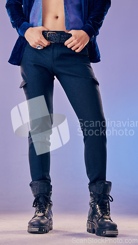 Image of Fashion, shoes and man in studio for vintage, retro and punk style against a gradient background mockup. Feet, model and rock n roll by model pose in trendy boots, urban style and gen Z aesthetic