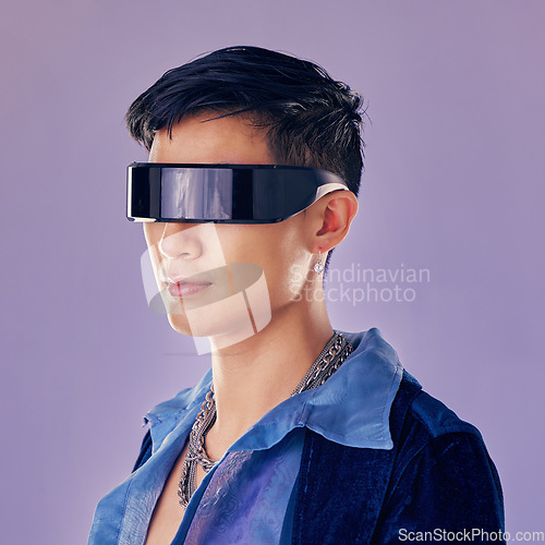 Image of Cyberpunk, fashion and futuristic asian man, jewellery and clothes with cool glasses in purple mockup studio background. Aesthetic, abstract and designer sunglasses on male model with sci fi style