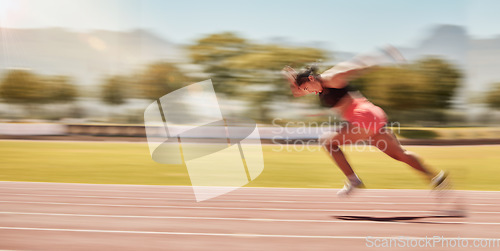 Image of Athlete, exercise and track running with a woman outdoor training for sports race or marathon or fitness with energy, agile and speed. Runner during workout for goal performance, challenge and race