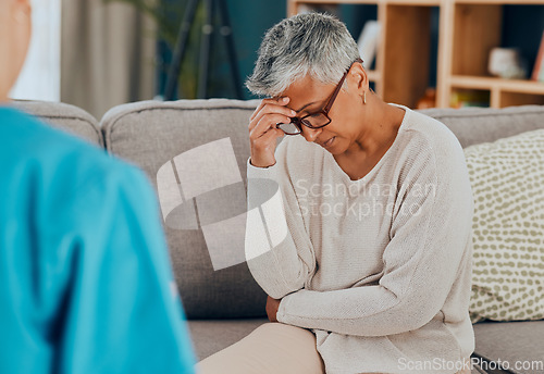 Image of Senior woman, stress and mental health in psychology with depression, support and counselling with therapist on sofa. Sad, communication and burnout with life problem, pain and psychologist help