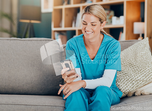 Image of Nurse, phone and happy with social media, post or funny meme on sofa in home. Woman with healthcare, medical and wellness app on mobile technology or search internet, reading news and text contact