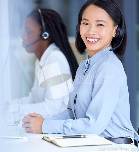 Image of Call center, crm and Asian worker with a smile for telemarketing, online support and customer service. Contact us, corporate and portrait of a Asian consultant working as an agent for a company