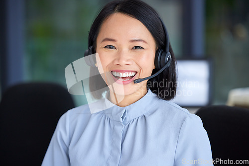 Image of Portrait, call center and customer service with an asian woman consultant working in a sales office. Crm, contact us and support with a happy female employee working in telemarketing or retail