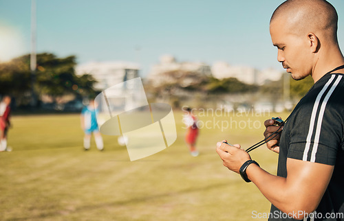 Image of Soccer, sports and coach with a stopwatch on a field for training, check and challenge with time. Football, fitness and man reading progress of team in sport at a park for motivation in competition