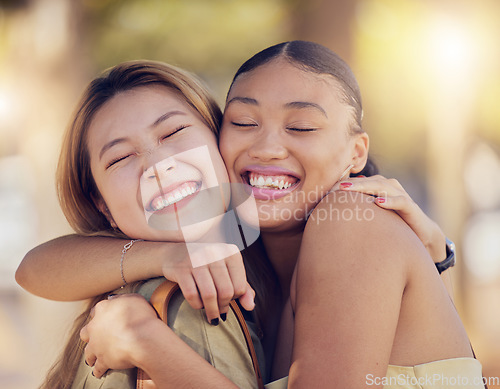 Image of Friends, women and hug for love, care and support while outdoor for travel, happiness and bonding with asian and black woman. Lesbian couple with a smile in nature for peace, summer and time together