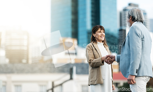 Image of Business people, handshake and partnership deal in the city for agreement, trust or b2b in the outdoors. Woman and man shaking hands for greeting, business proposal or meeting idea startup on mockup