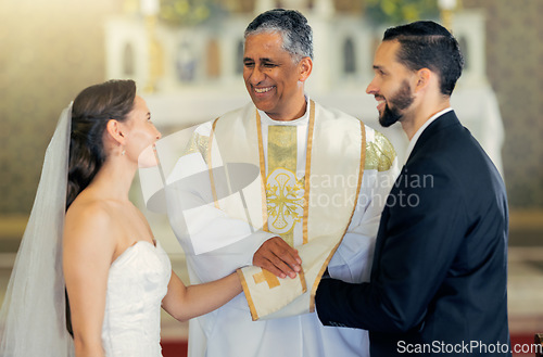 Image of Wedding, priest and couple holding hands in church for a christian marriage oath and faithful commitment. Trust, bride and happy groom with a supportive pastor helping them make a holy love promise