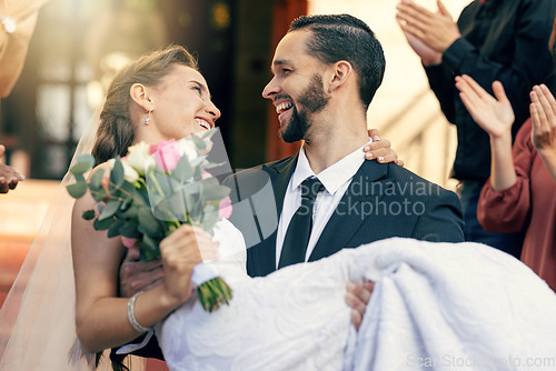 Image of Love, wedding and man carrying woman at church after marriage ceremony with applause of friends and family. Happy, smile and celebration of married bride and groom after event with audience clapping.