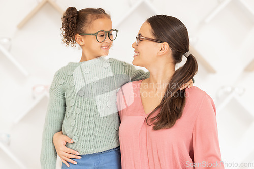 Image of Mother, girl child and glasses in shop, happy with clear vision and eyesight with prescription specs. Healthcare, medical insurance and mom with smile and kid shopping for new spectacles or frames.