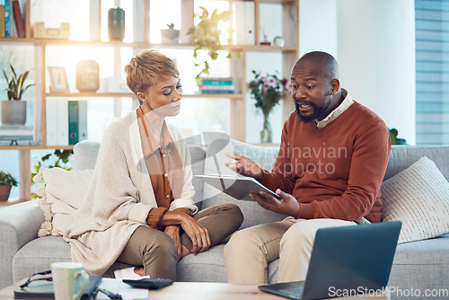 Image of Finance, mortgage and black couple in debt planning a budget, savings or insurance payments at home. Mature, inflation and married black woman talking to an African angry partner about money problems