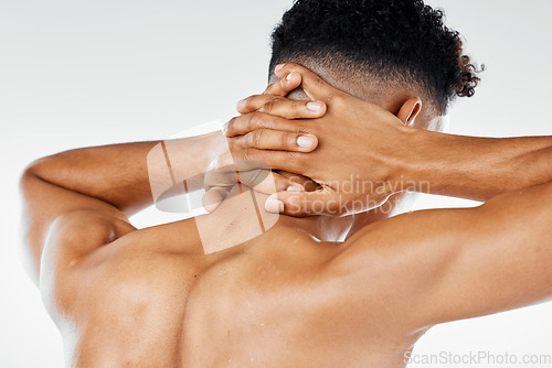 Image of Neck pain, injury and hands of man in studio for spine, bone or muscle tension against a white background mockup. Hand, Neck and bone pain by by male with sports injury, inflammation and tension