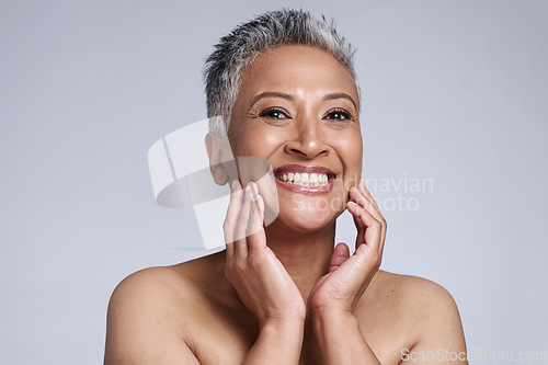 Image of Face, hands and beauty with antiaging and woman, smile in portrait for skincare with studio background. Facial, treatment and face care mockup with natural cosmetics and happy mature model in makeup.