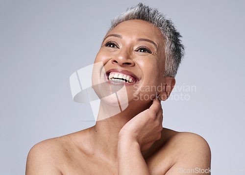 Image of Beauty, woman with smile and skincare with antiaging for healthy skin and natural cosmetics against studio background. Happy, facial and cosmetic treatment with fresh glow and clean mockup.