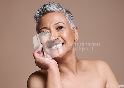 Image of Face, skin and beauty with woman in antiaging skincare portrait, smile and healthy glow with cosmetics and dermatology against brown studio background. Facial, botox and treatment with makeup mockup.