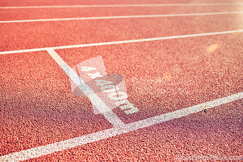 Image of Ground, field and race track road in stadium for fitness, running track and sports with nobody. Pattern, texture and background of empty racecourse with no people for exercise, workout and training