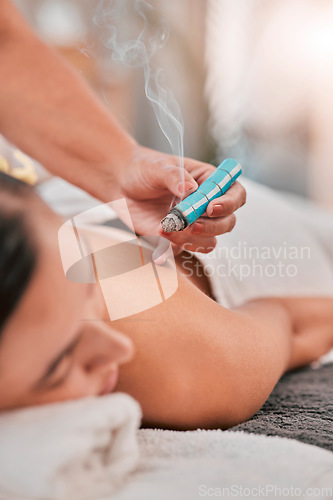 Image of Spa, wellness and luxury meditation for woman on massage bed. Zen, healthy skincare and smoke therapy for mindfulness, beauty and balance chakra energy or relax, calm and mental or skin healthcare