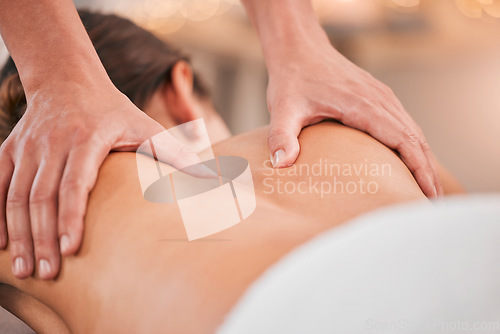 Image of Spa, relax and massage with back of woman for beauty, skincare and wellness therapy. Peace, health and luxury with hands of therapist and customer for salon, muscle and physiotherapy body care