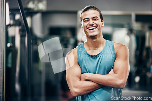 Image of Fitness, gym and happy portrait of personal trainer man ready for workout coaching. Training, wellness and exercise coach confident with arms crossed at professional athlete health club.