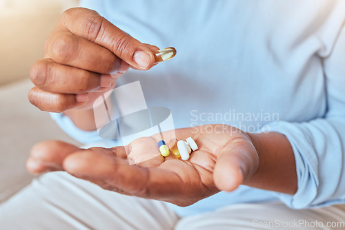 Image of Health, wellness and pills in hand for medicine self care of black woman for pharmaceutical routine. Drugs, supplement and healthy chronic medication for vitality lifestyle of lady with hands zoom.