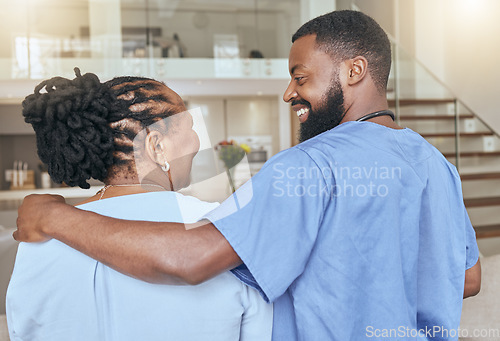 Image of Support, care and nurse with a senior black woman for healthcare, medical trust and consultation in a nursing home. Back of African man in medicine helping elderly patient while consulting at house
