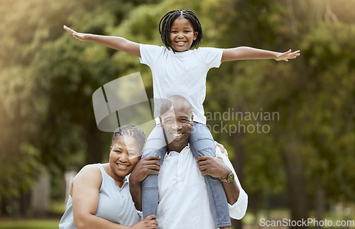 Image of Portrait of a happy black family in nature to relax bonding in freedom, wellness and peace together in a park. Mother, father and child loves flying, hugging or playing outdoors enjoying quality time