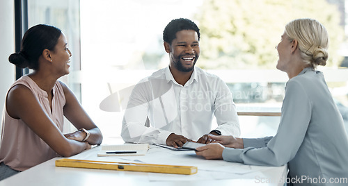 Image of Meeting, teamwork and architecture with a business group planning a building project in an office boardroom. Architect, designer and engineer working together in collaboration as a team on a design