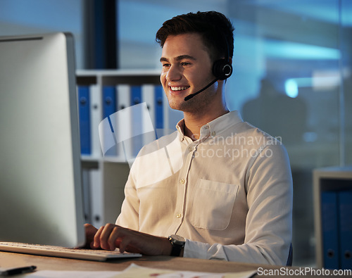 Image of Customer support service employee, smile at night and working on helping client with faq solution in digital call center. Telemarketing business, crm consultant at office desk and online consultant