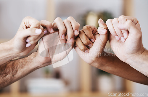Image of Hands, teamwork and support with a man and woman group holding fingers or thumbs in solidarity. Trust, community and help with a male and female team holding hands together in partnership or care