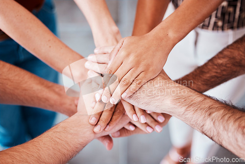 Image of Top view, hands and together to connect, for support and solidarity and team building for success, agreement and being community. Hand gesture, group stack pile and connection for loyalty and unity.