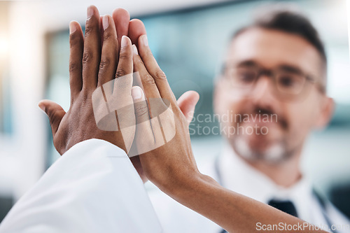 Image of Group high five, diversity and hands together for teamwork, support and collaboration in the workplace. Solidarity, team building and professional friends with a goal, target and mission of success