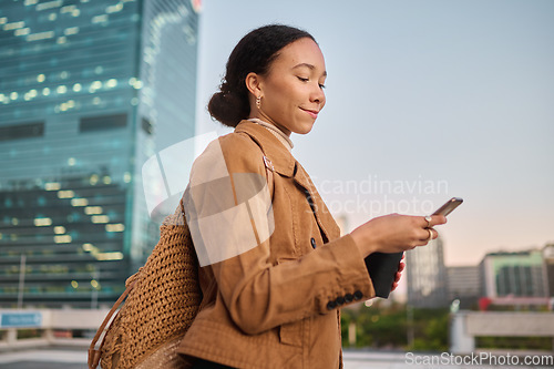 Image of Black woman, smartphone and outdoor for communication, search internet and browse online. African American female, young lady and in city with cellphone for social media apps, chatting and connect.