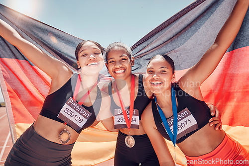 Image of Winning, friends and portrait of women athletes with germany flag and medal to celebrate success. Winner, celebration and girl team proud of achievement, goal or win at marathon, race or sports event