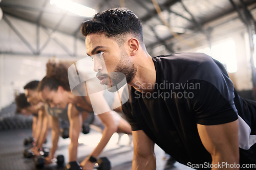 Image of Workout class, planking and black man with motivation in a gym, fitness and exercise gym challenge. Training, sport and body balance of a athlete doing muscle cardio with commitment in wellness club