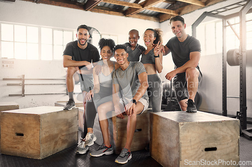 Image of Friends, fitness and exercise with portrait, gym and diversity people smile for health, wellness and commitment. Group, men and women rest after cardio, training and workout for strong body together