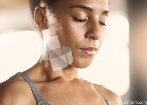 Image of Woman, tired face and sweating in gym workout, training or exercise for body goals, heart health or cardio wellness. Zoom, exhausted or fatigue sports athlete, fitness coach or personal trainer break