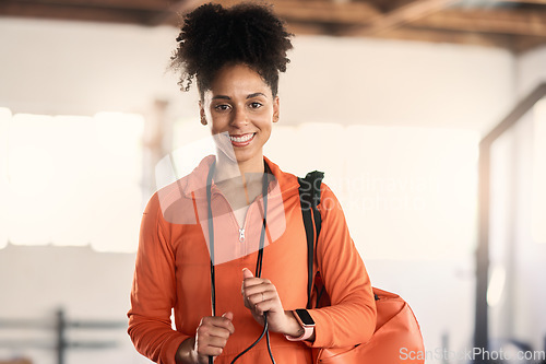 Image of Portrait, fitness and gym with a sports black woman ready for exercise or training alone in a health club. Wellness, workout and healthy with a strong or attractive young female in a sport facility