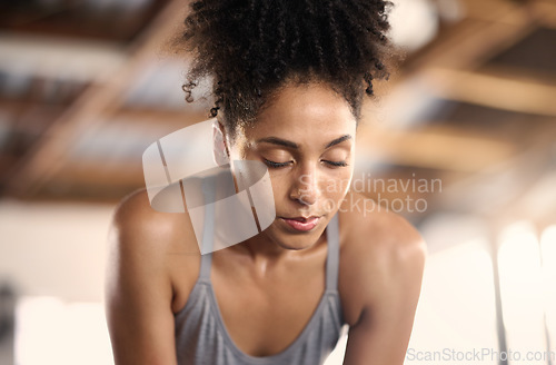 Image of Tired gym black woman breathing, challenge and training fatigue, healthy risk or body struggle for sports exercise. Sweating female athlete face, break and rest at workout mindset, focus and breathe