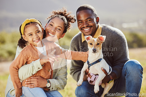 Image of Family, portrait and dog at park with girl and parents relax, bond and play, happy and smile in nature. Black family, pet and having fun on a field, embrace and enjoy quality time with jack russell