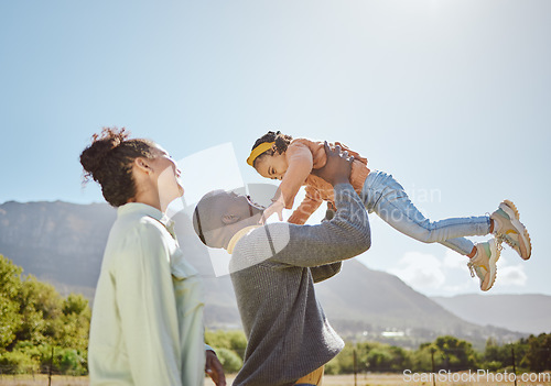 Image of Black family, nature and parents play with child on weekend countryside vacation for peace, freedom and quality time. Love, trust and fun happy family of mother, father and kid girl bonding together
