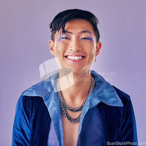 Image of Beauty, makeup and man in studio for skincare, luxury and creative, expression and fashion purple background mockup. Portrait, asian man and lgbt model happy, smile and relax, vaporwave and aesthetic