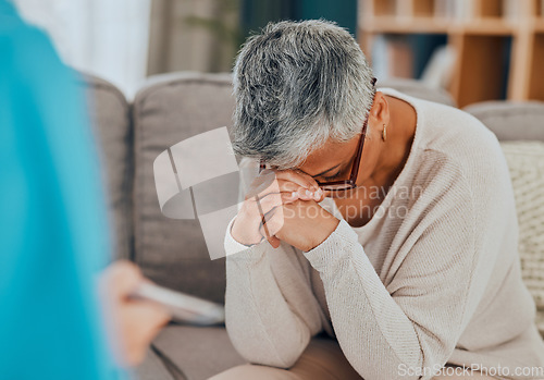 Image of Senior woman, support and mental health on sofa in therapy or counseling help for depression, anxiety and healthcare. Psychologist appointment, sad female on couch or consulting in psychology office