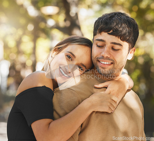 Image of Love, couple and hug being happy, smile and romantic for relationship, bonding and outdoor together. Romance, man and woman embrace, being loving and connect for happiness, passion and content.