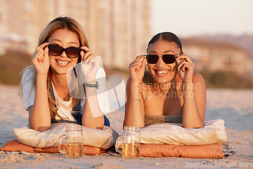 Image of Beach, happy and friends relaxing with sunglasses while on a summer vacation together in Mauritius. Freedom, travel and women on a tropical holiday, adventure or journey in nature by the ocean or sea