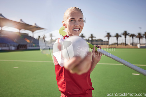 Image of Sport, hockey and woman with fitness on field, athlete in stadium portrait, happy with exercise outdoor. Hockey player, ball and stick on turf ready for game, training and sports motivation.