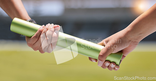 Image of Teamwork, relay race and hands on baton, fitness competition and women running on track and field. Sports, wellness and woman runner team with trust and collaboration for winning at race track event.