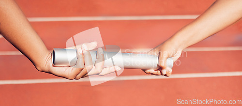 Image of Hands, baton and relay race with a sports woman team passing equipment during a competitive track event. Fitness, training and running with a female athlete and teamwork partner racing together