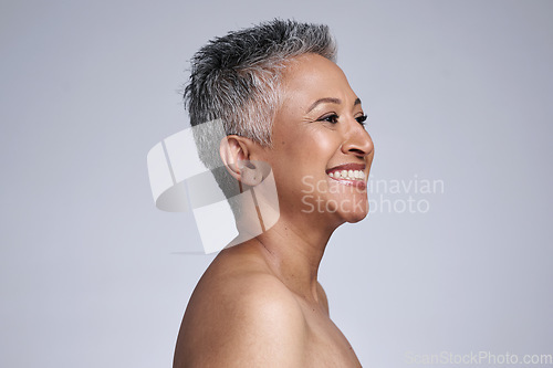 Image of Skincare, beauty and senior woman in studio happy with cosmetics, makeup and facial wellness with mock up for marketing, promotion or advertising. Smile of an elderly or old woman model for skin care